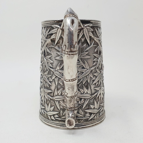 649 - A 19th century Chinese silver coloured metal mug, of tapering cylindrical form, inscribed and dated ... 