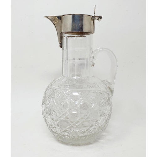 585 - A silver mounted cut glass claret jug, London 1914, 19.5 cm high