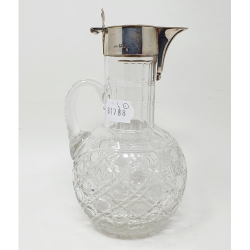 585 - A silver mounted cut glass claret jug, London 1914, 19.5 cm high