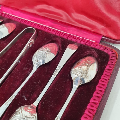 688 - A set of six picture back spoons, with matching sugar tongs, including a dolphin and fox hunting, Sh... 