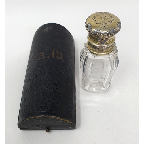 618 - A 19th century French silver gilt coloured metal and glass scent bottle, initialled, the body inscri... 