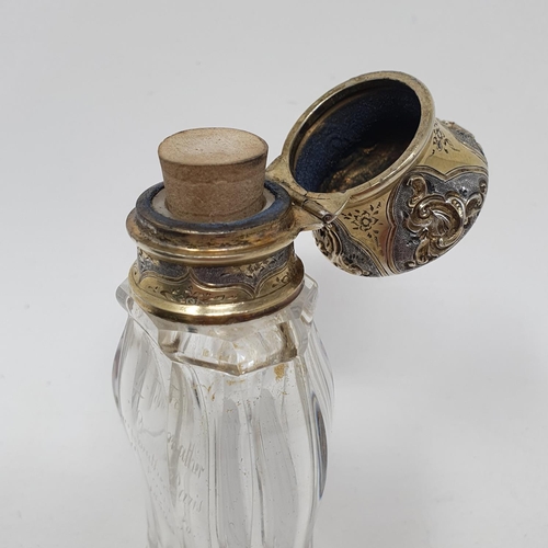 618 - A 19th century French silver gilt coloured metal and glass scent bottle, initialled, the body inscri... 