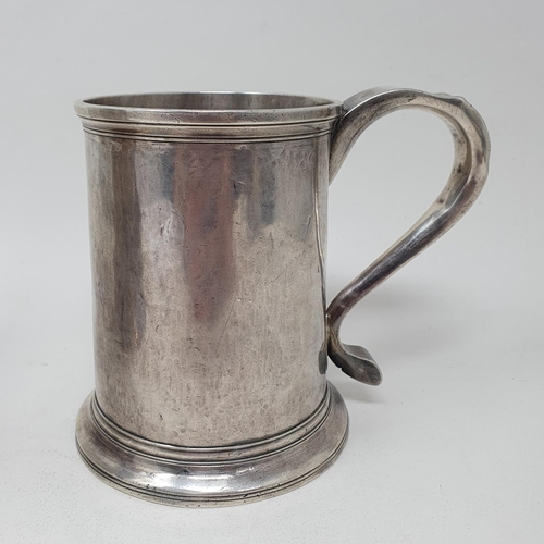 655 - A mid 18th century silver tankard, of slender tapering form, John Langlands, Newcastle 1774, 9.8 ozt... 