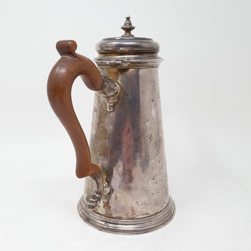 638 - A George II silver coffee pot, of tapering cylindrical form, the spout with an acanthus leaf, London... 