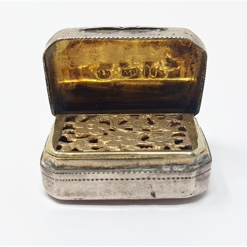 670 - A 19th century vinaigrette, a rectangular form having canted corners, with a floral pierced grill, 2... 