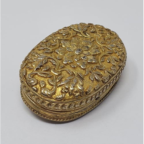 607 - A silver gilt coloured metal Continental box, of rounded rectangular form, embossed flowers and foli... 