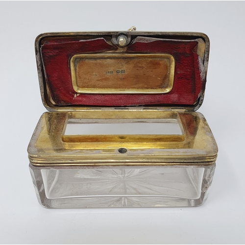 675 - An early 19th century silver gilt and glass box, with a screw down cover, initialled, and with engin... 