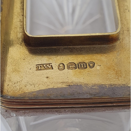 675 - An early 19th century silver gilt and glass box, with a screw down cover, initialled, and with engin... 