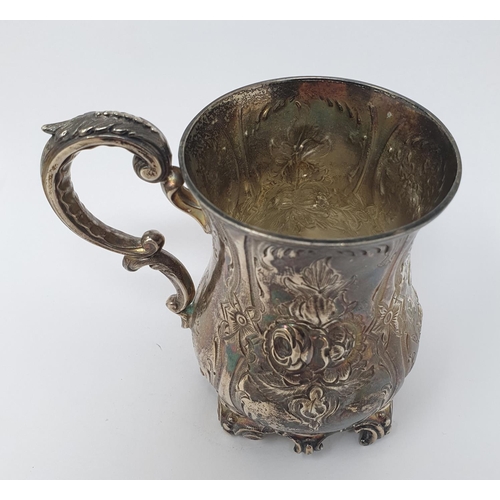 650 - A Victorian silver christening mug, embossed flowers and foliage, initialled, Sheffield 1882, 4.4 oz... 