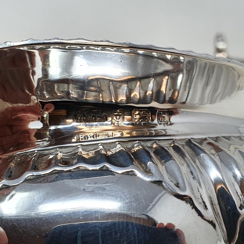 411 - An Edward VII silver oval sugar bowl, and a matching cream jug, Birmingham 1907, 10.6 ozt  Provenanc... 