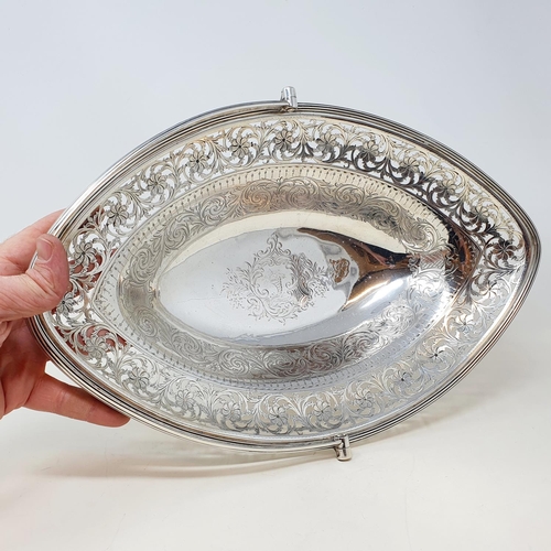 413 - A George III silver swing handled bread basket, with pierced floral decoration, London 1793, 29.54 o... 