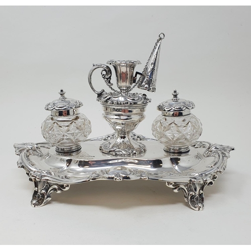 449 - An Edward VII silver desk stand, center bowl with a miniature chamber stick, flanked by cut glass in... 