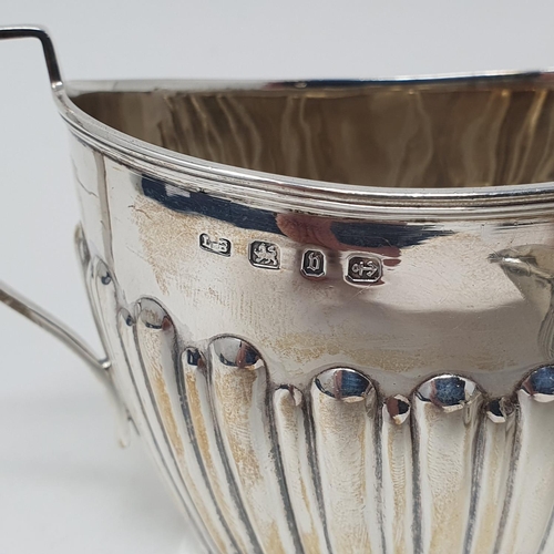 455 - A Victorian silver sugar bowl, Birmingham 1895, and a Victorian silver cream jug, Birmingham 1881, 4... 