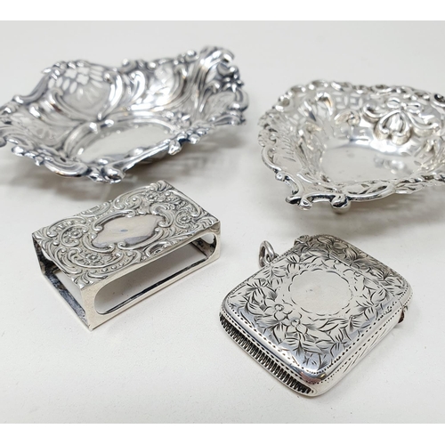 460 - A Victorian silver vesta, Birmingham 1898, a silver matchbox holder, and two pierced silver dishes, ... 