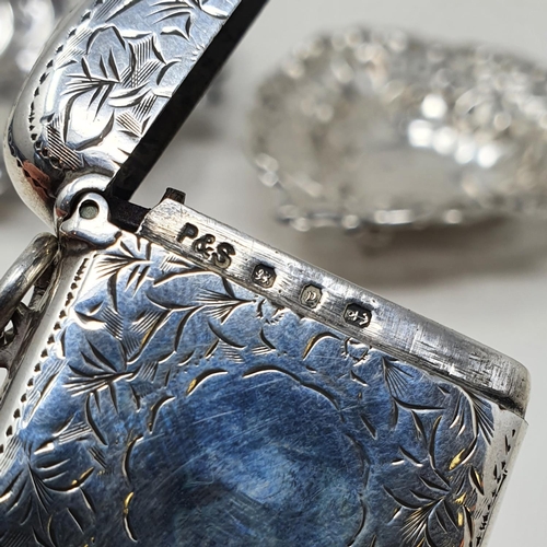 460 - A Victorian silver vesta, Birmingham 1898, a silver matchbox holder, and two pierced silver dishes, ... 