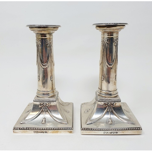 474 - A pair of George V silver candlesticks in the form of columns, London 1928, makers mark for Mappin &... 