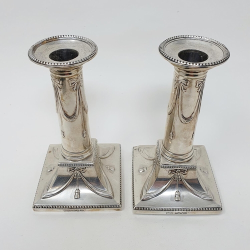 474 - A pair of George V silver candlesticks in the form of columns, London 1928, makers mark for Mappin &... 