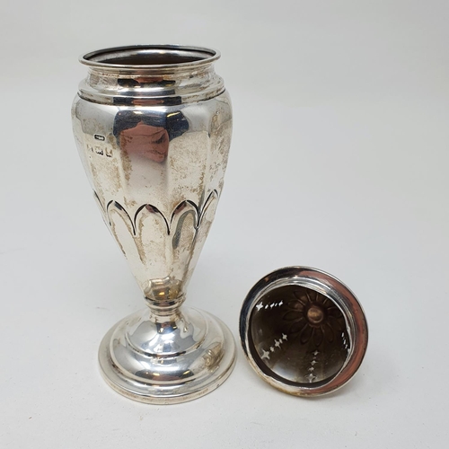 502 - A George V silver sifter, Birmingham 1922, filled, 16 cm high Provenance: From a large single owner ... 