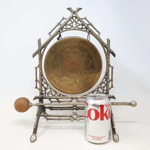 541 - A late Victorian silver plated table gong, of crabstock form, with a beater, 36 cm high