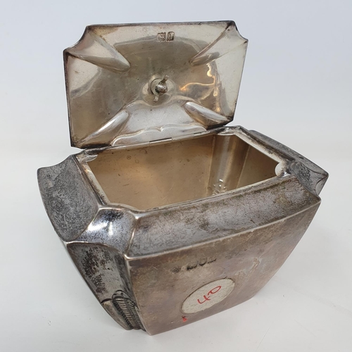 571 - A silver tea caddy, of rectangular form, with re-entrant corners, London 1899, 7.4 ozt (all in)