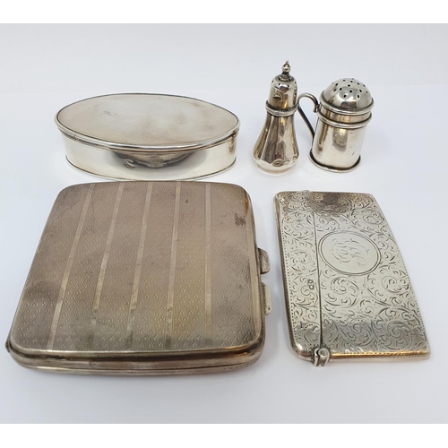 611 - A George V silver cigarette case, a card case, two novelty pepperettes, and a Continental silver ova... 