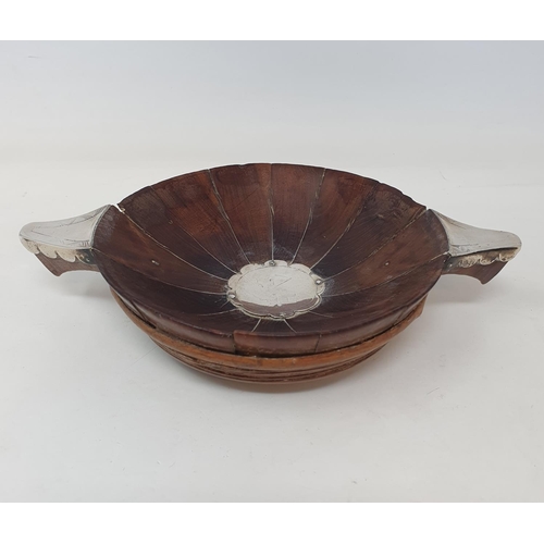 617 - An early 19th century Scottish treen quaich, with white metal mounts, 22 cm wide