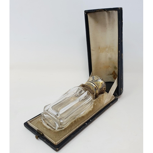 618 - A 19th century French silver gilt coloured metal and glass scent bottle, initialled, the body inscri... 