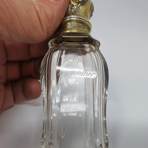 618 - A 19th century French silver gilt coloured metal and glass scent bottle, initialled, the body inscri... 