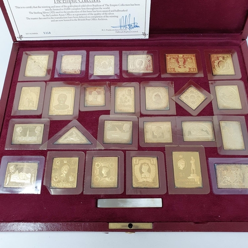 633 - The Empire Collection of gold plated silver stamps, No 5318, cased, with certificate