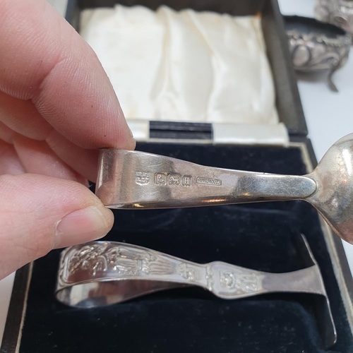 635 - A child's Punch & Judy spoon and pusher set, Birmingham 1934, boxed, a set of four silver salt spoon... 