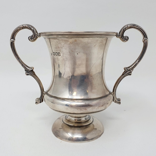 644 - A silver two handled trophy cup, London 1912, 7.7 ozt, 13.5 cm high