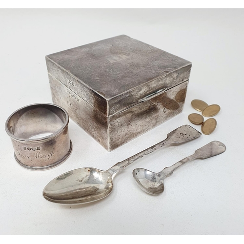 692 - A pair of 9ct gold cufflinks, 6.6 g, a silver cigarette box, a napkin ring, a teaspoon and a salt sp... 