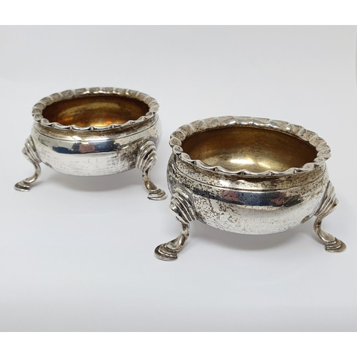 697 - A pair of mid 18th century silver salts, on three pad feet, marks rubbed, London 1768, 4.5 ozt (2)