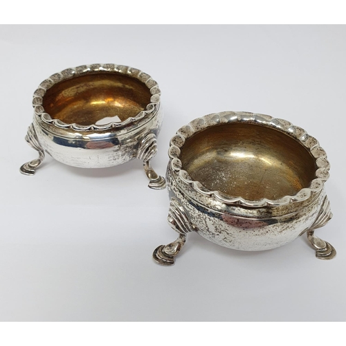 697 - A pair of mid 18th century silver salts, on three pad feet, marks rubbed, London 1768, 4.5 ozt (2)