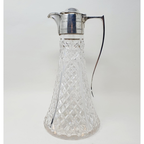 703 - A George V cut glass claret jug, with a silver mount, engraved Golfers Club Open Amateur Meeting 193... 