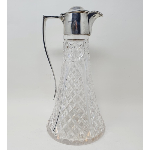 703 - A George V cut glass claret jug, with a silver mount, engraved Golfers Club Open Amateur Meeting 193... 