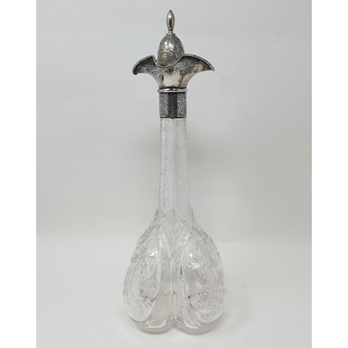 709 - An Edward VII rock crystal cut decanter with a silver mount, Sheffield, 1905, 35 cm high