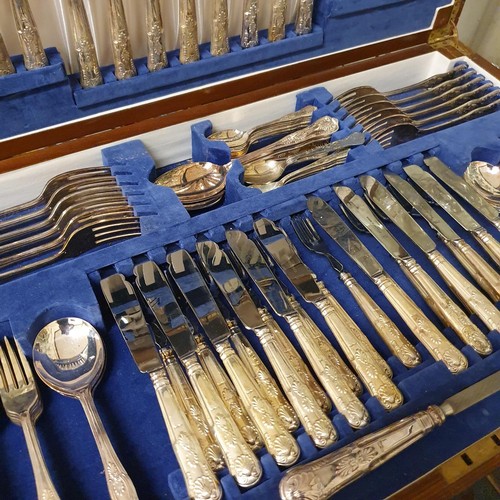 540 - A Viners silver plated canteen of cutlery, in a walnut case, raised on cabriole legs