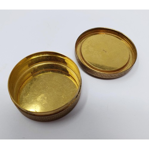 707 - A Continental silver gilt and blue enamel pill box, stamped A H. NAGUIB BUY, 4.5 cm diameter