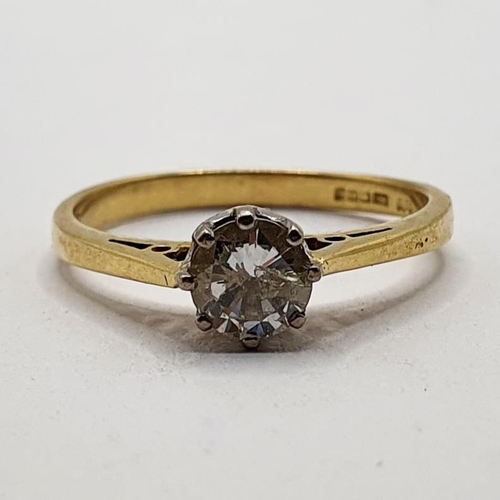 802 - An 18ct gold and diamond solitaire ring, ring size L 1/2