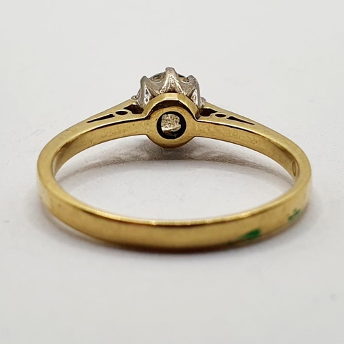 802 - An 18ct gold and diamond solitaire ring, ring size L 1/2