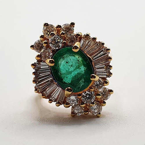 803 - An 18ct gold, emerald and diamond ring, ring size M