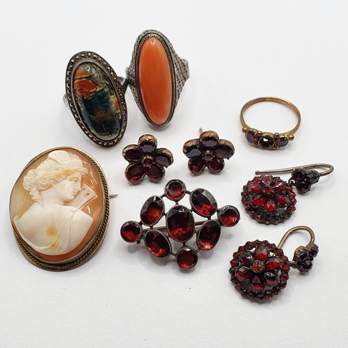 804 - A pair of 19th century earrings, set with red stone, another pair of earrings, two rings, and other ... 