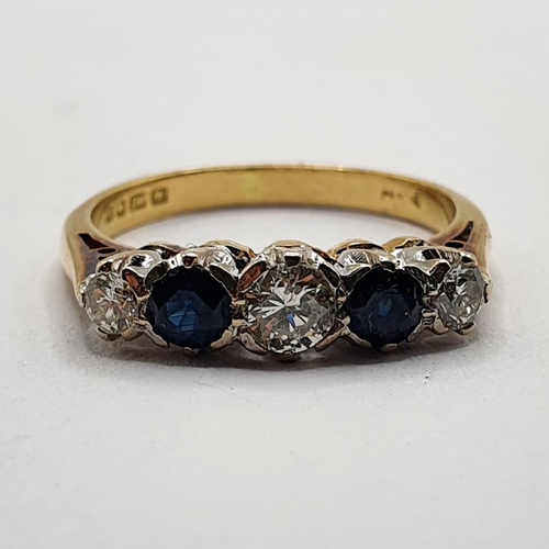 807 - An 18ct gold, sapphire and diamond five stone ring, ring size M