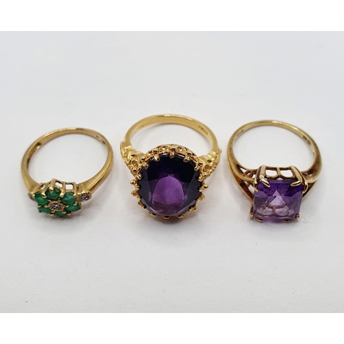 809 - ***WITHDRAWN*** A 9ct gold and amethyst ring, ring size M, and two other rings (3)