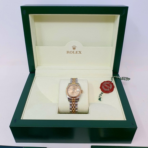 752 - A ladies stainless steel and gold Rolex Oyster Perpetual Datejust wristwatch, with a champagne dial ... 