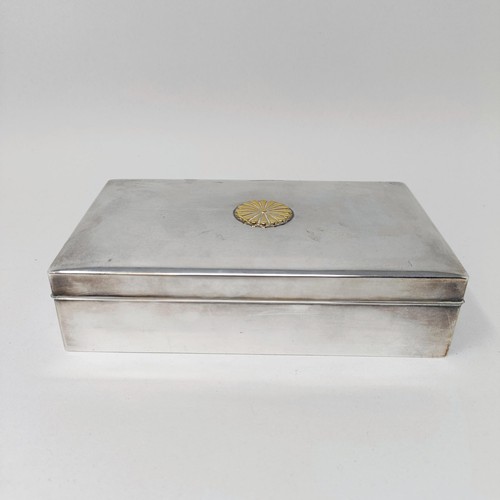 711 - A Continental sterling silver cigarette box, with a yellow metal mount