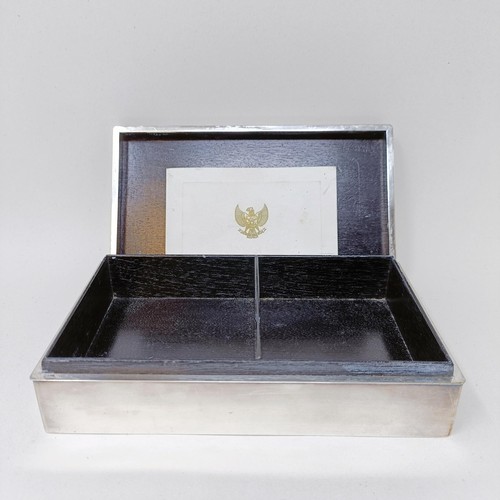 711 - A Continental sterling silver cigarette box, with a yellow metal mount