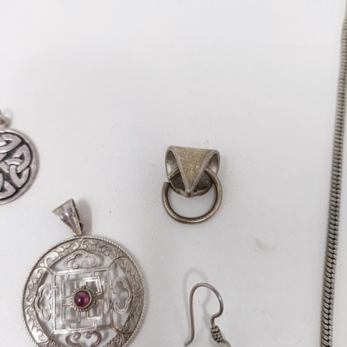 998A - A Tibetan pendant, and matching earrings, a silver pendant, and assorted jewellery