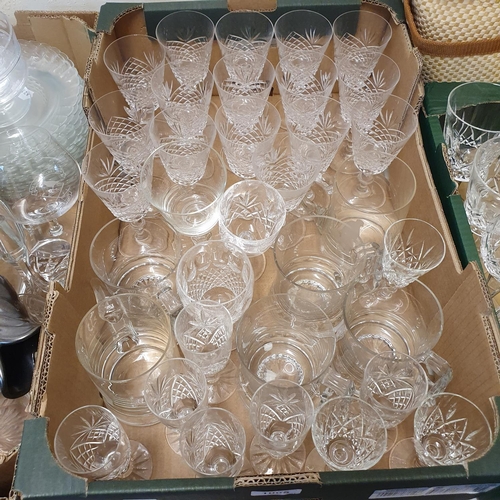 1005 - A set of four Waterford wine glasses, other glassware, a picnic set, and a box of assorted linen (5 ... 